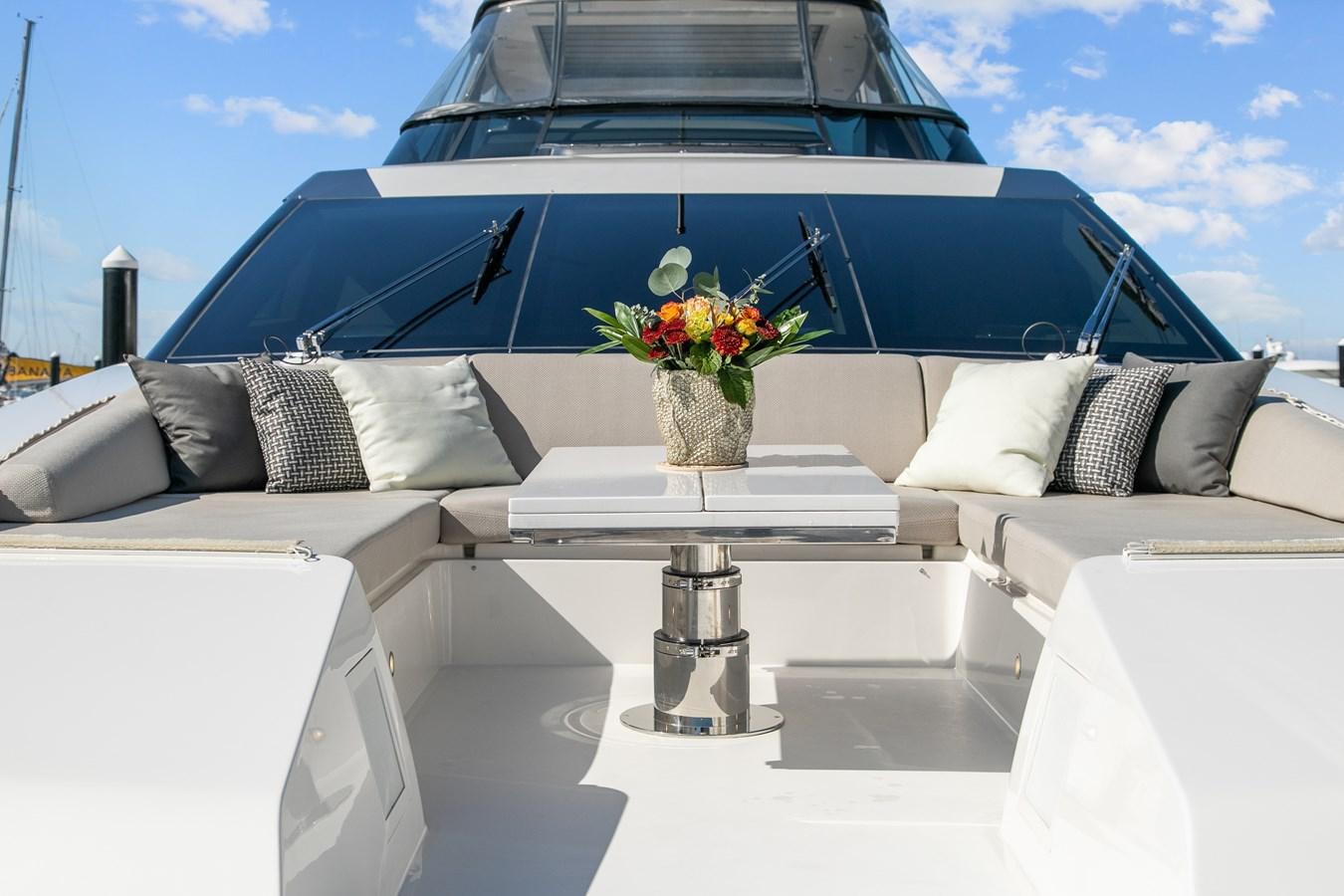 a white car with a white interior aboard MISS LIZA Yacht for Sale