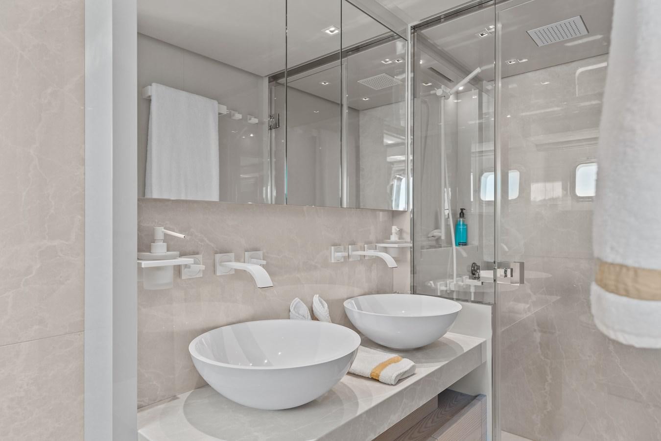 a bathroom with two sinks aboard MISS LIZA Yacht for Sale
