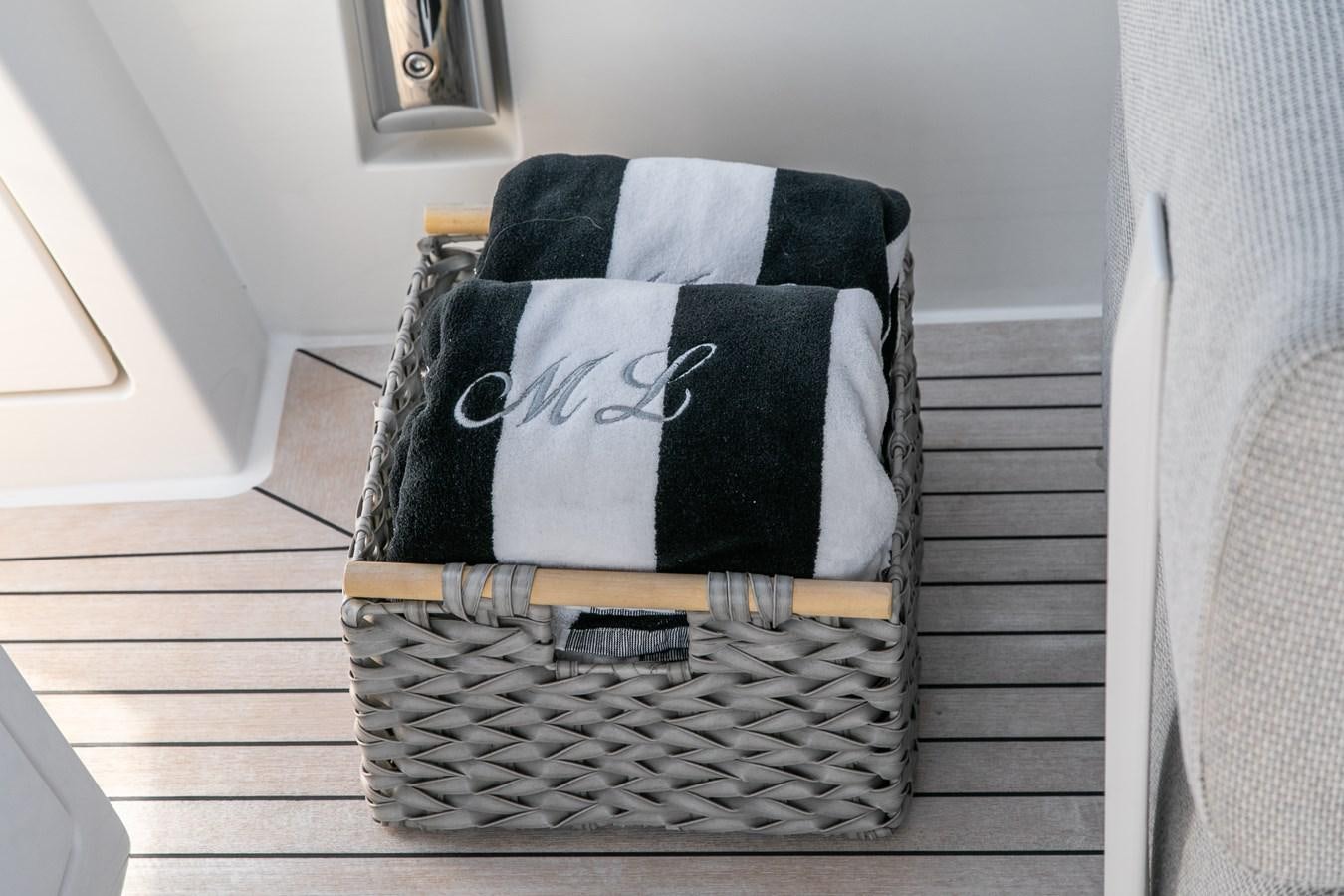 a black and white striped chair aboard MISS LIZA Yacht for Sale