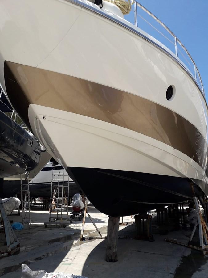 a large white boat aboard SLO Yacht for Sale