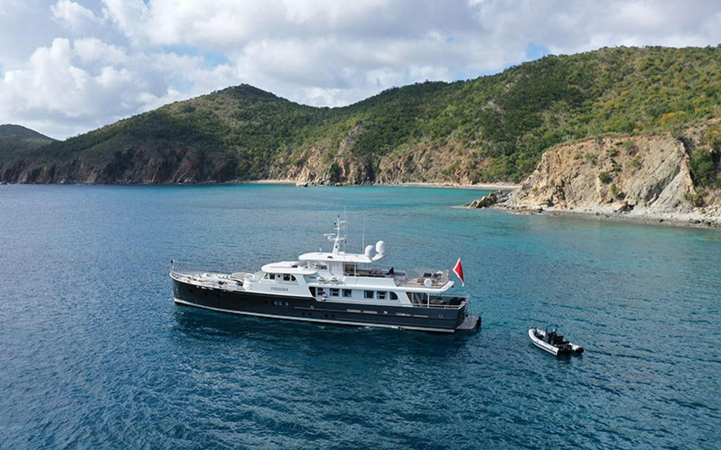 a boat sailing in the sea aboard PERSUADER Yacht for Sale