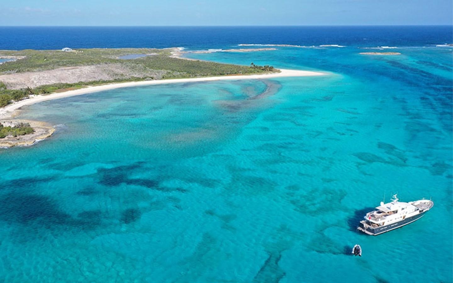 a boat in the water aboard PERSUADER Yacht for Sale