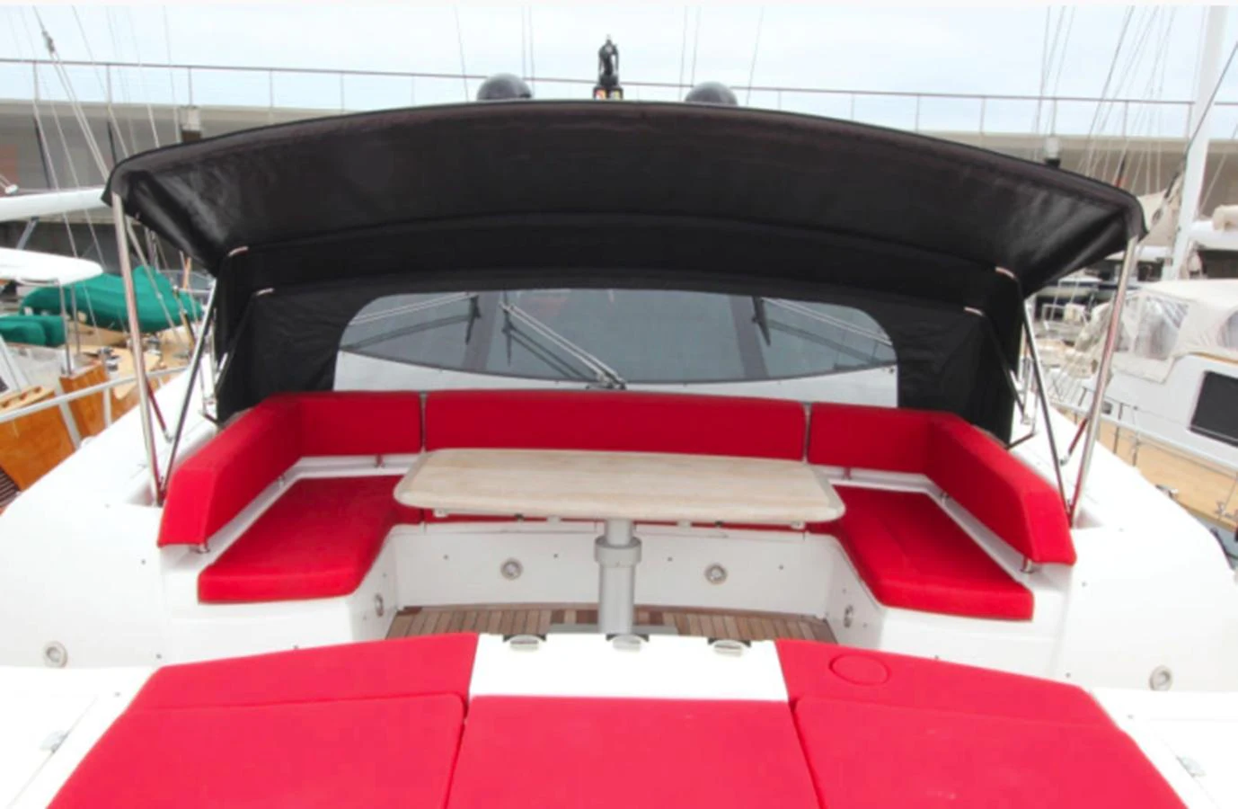 the back of a red and white car aboard NOVA 92 Yacht for Sale