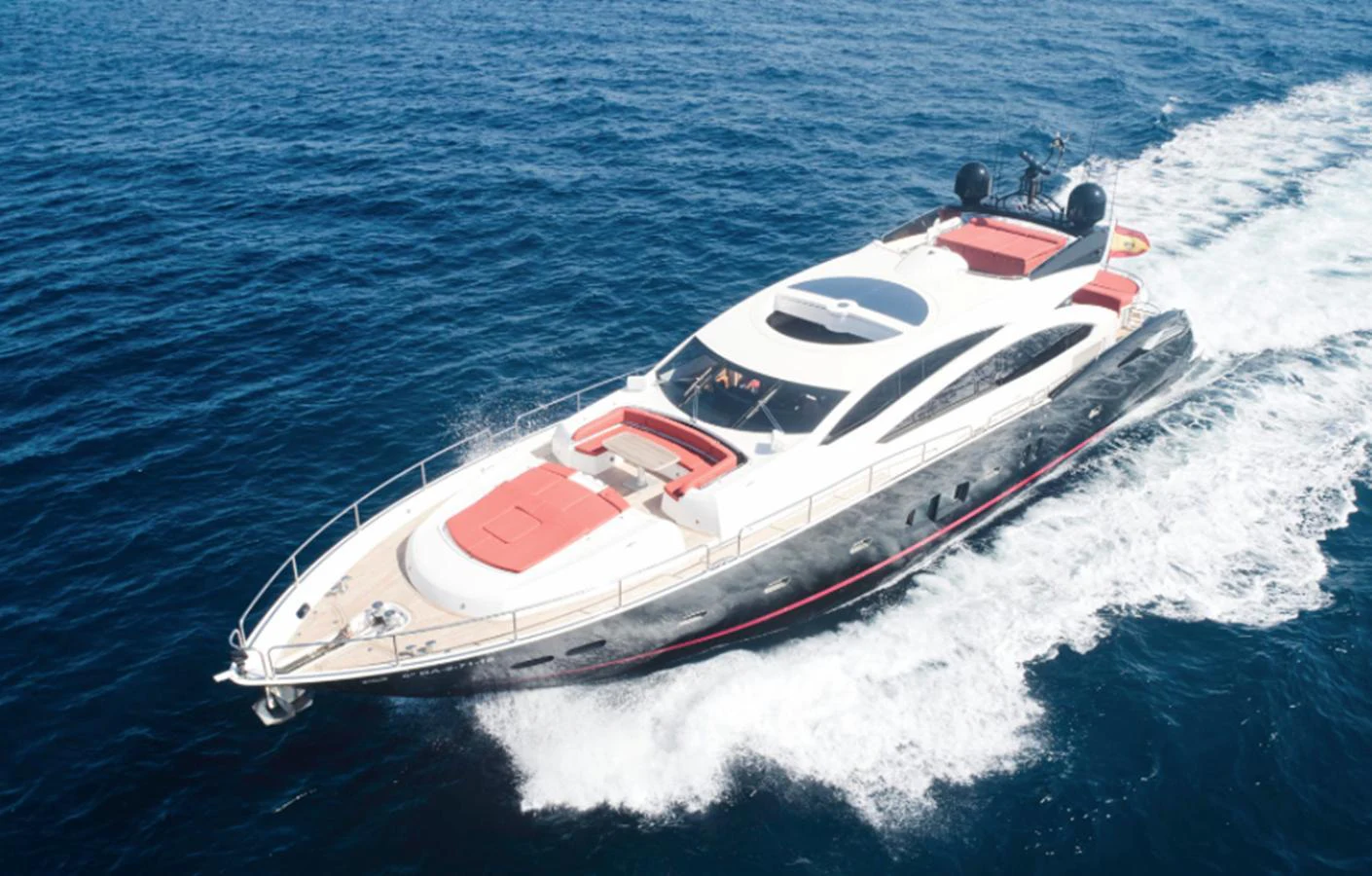 a white and red boat in the water aboard NOVA 92 Yacht for Sale