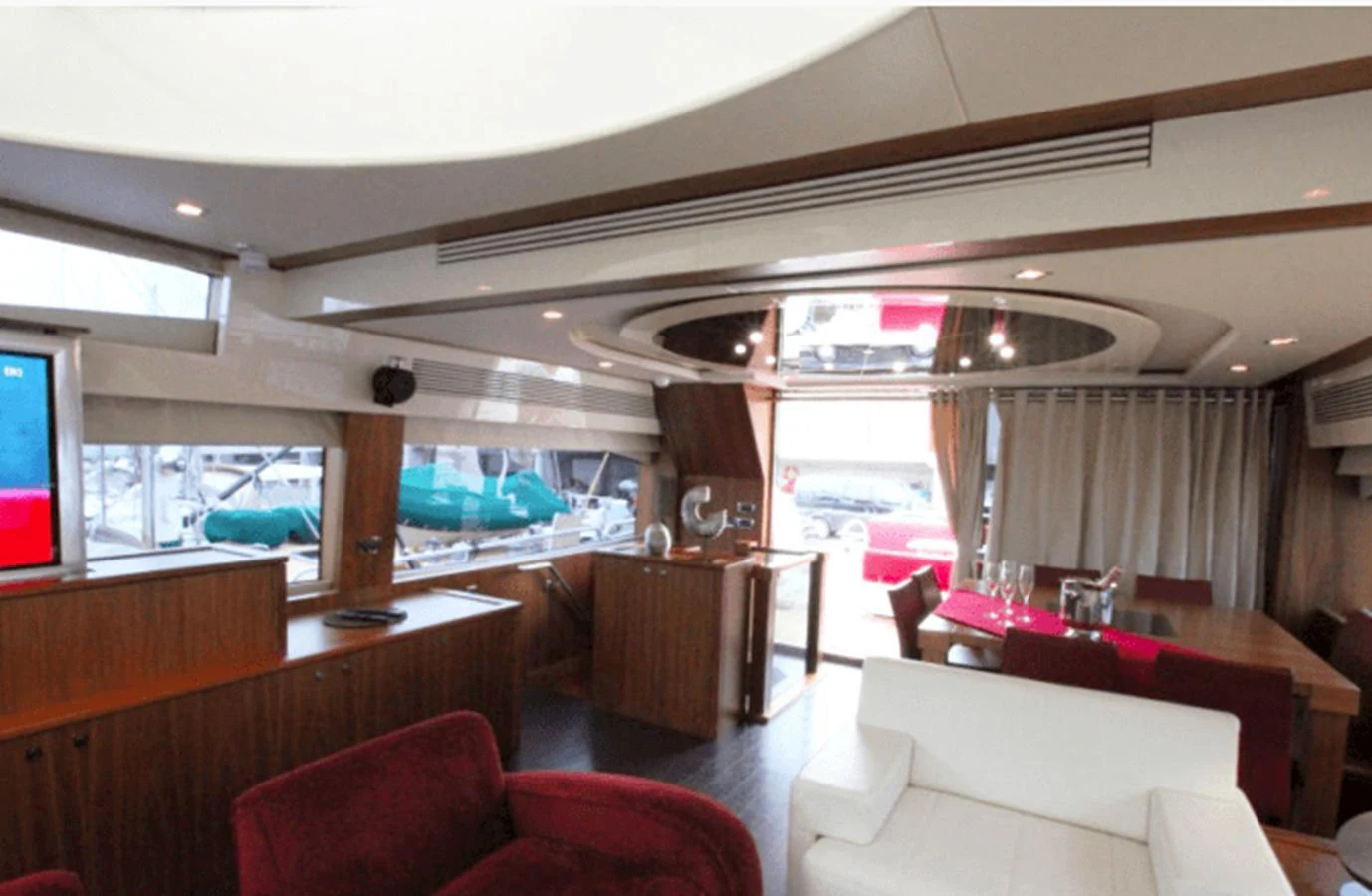 inside of a building with a view of the water and the deck aboard NOVA 92 Yacht for Sale