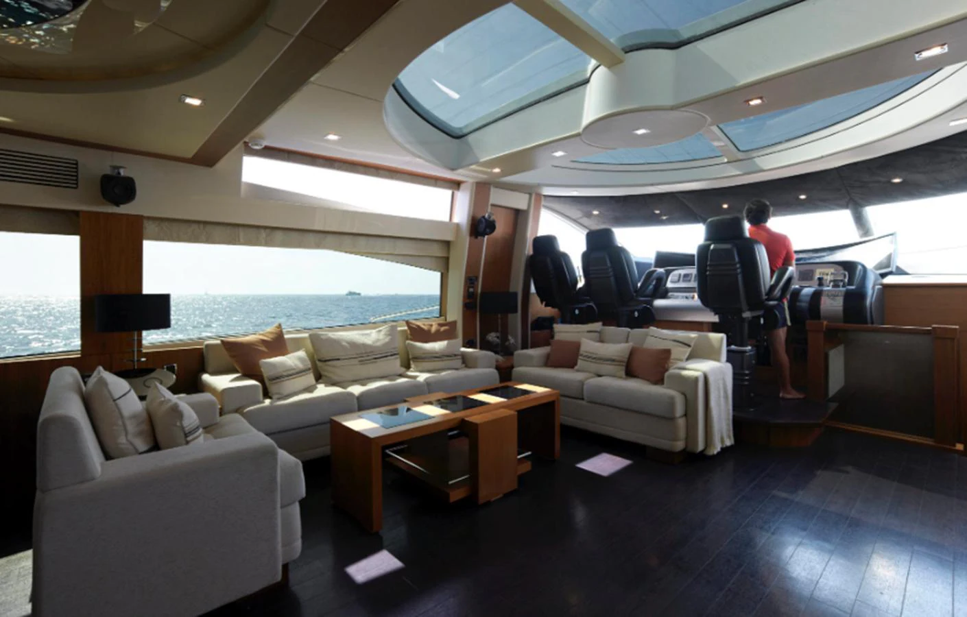 a room with a couch and a table aboard NOVA 92 Yacht for Sale