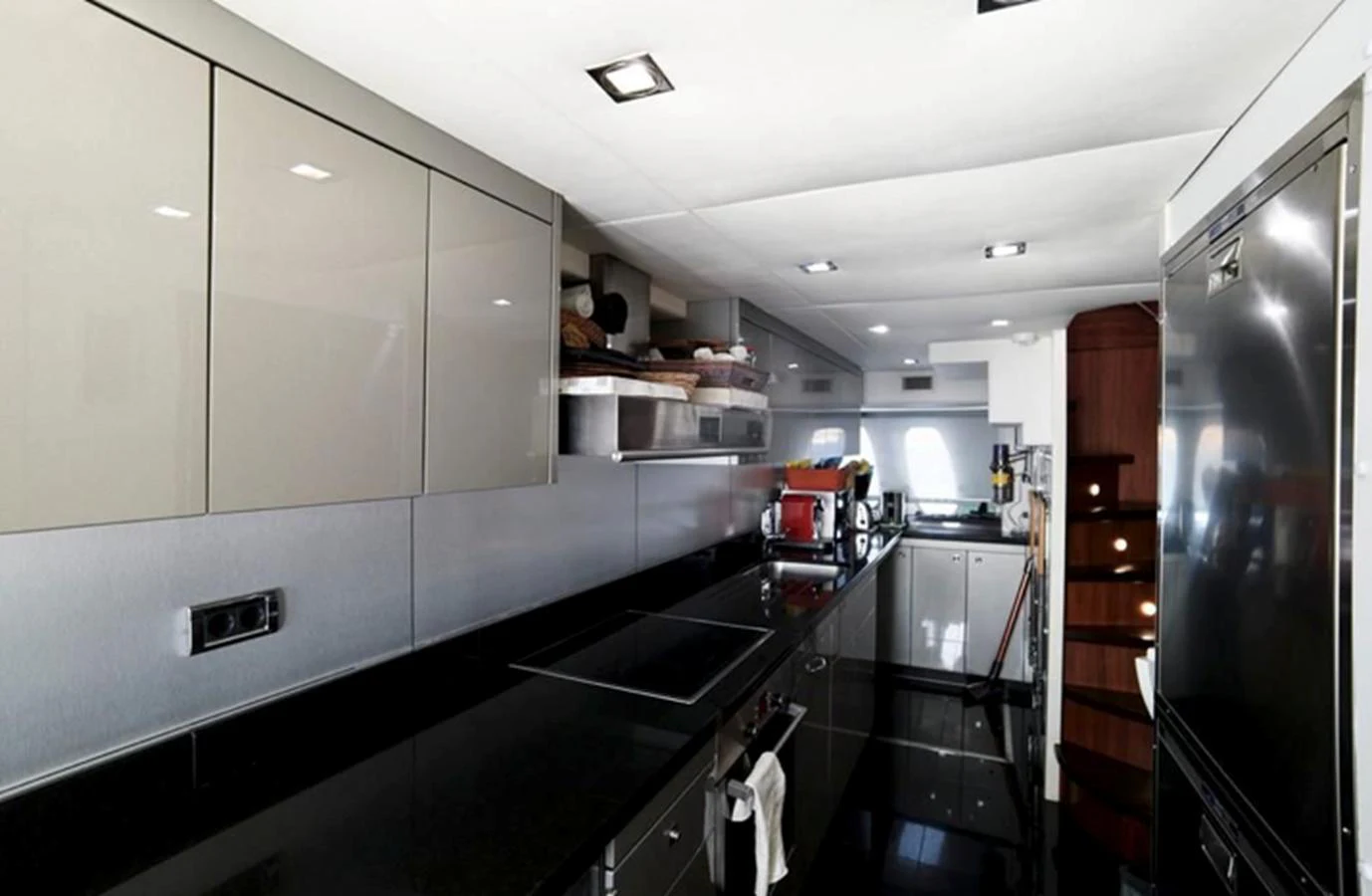 a kitchen with a large island aboard NOVA 92 Yacht for Sale