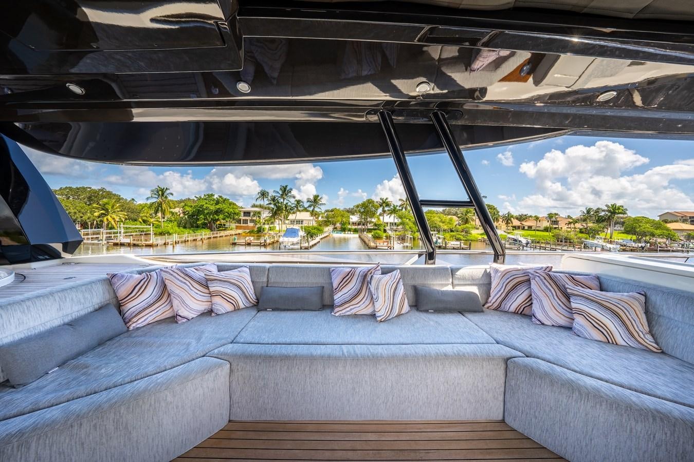 a couch with a blue cover aboard NEVER SAY NEVER 2015/2023 Yacht for Sale