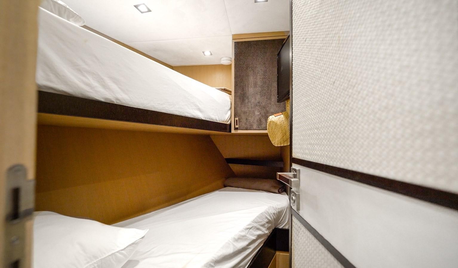 a room with two beds aboard NEVER SAY NEVER 2015/2023 Yacht for Sale