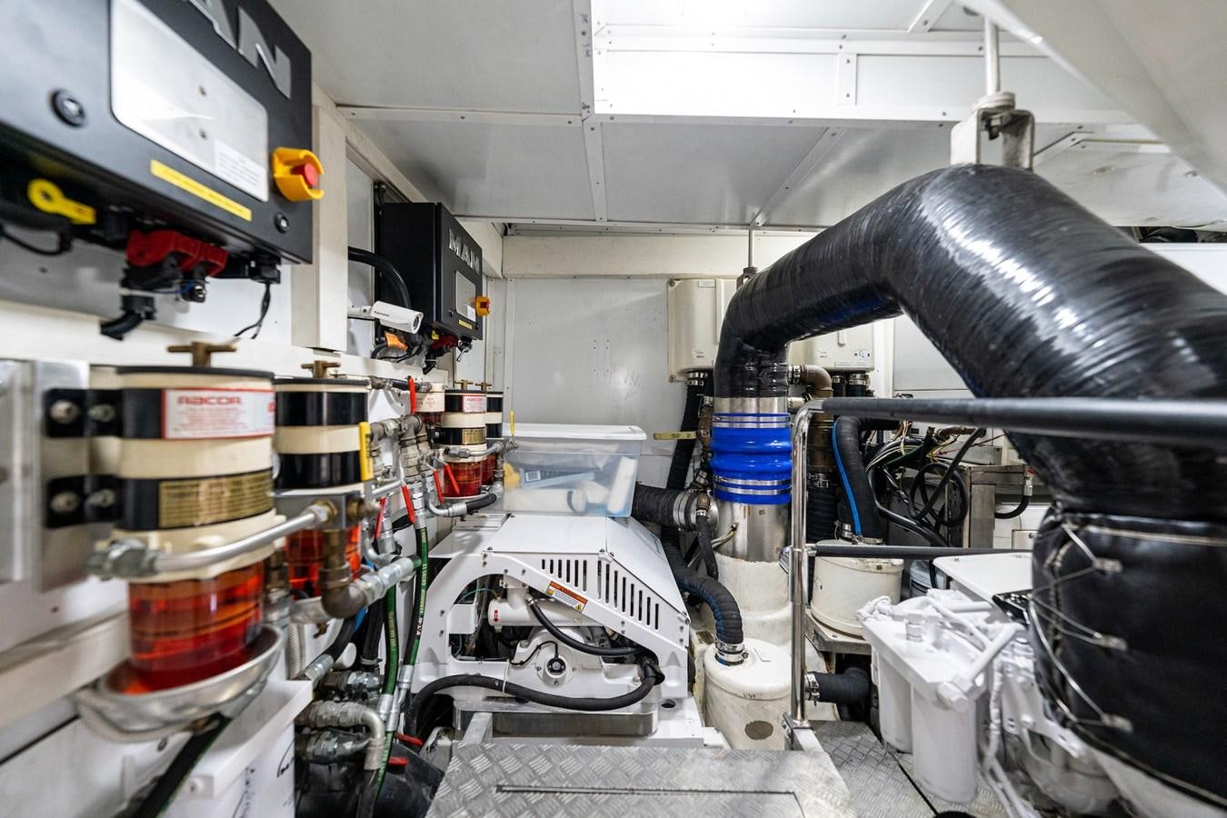 a machine in a room aboard NEVER SAY NEVER 2015/2023 Yacht for Sale