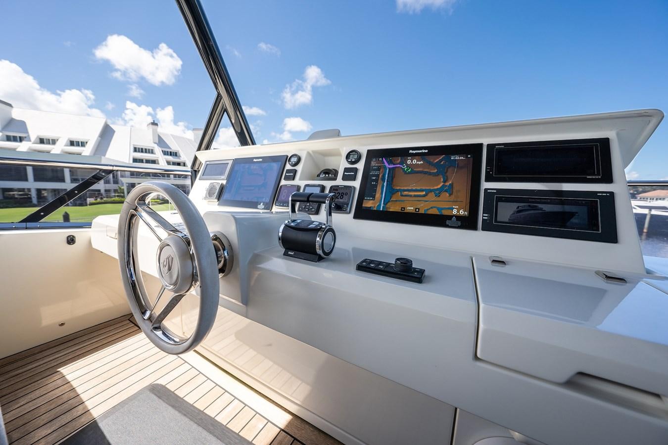 a boat with a steering wheel aboard NEVER SAY NEVER 2015/2023 Yacht for Sale