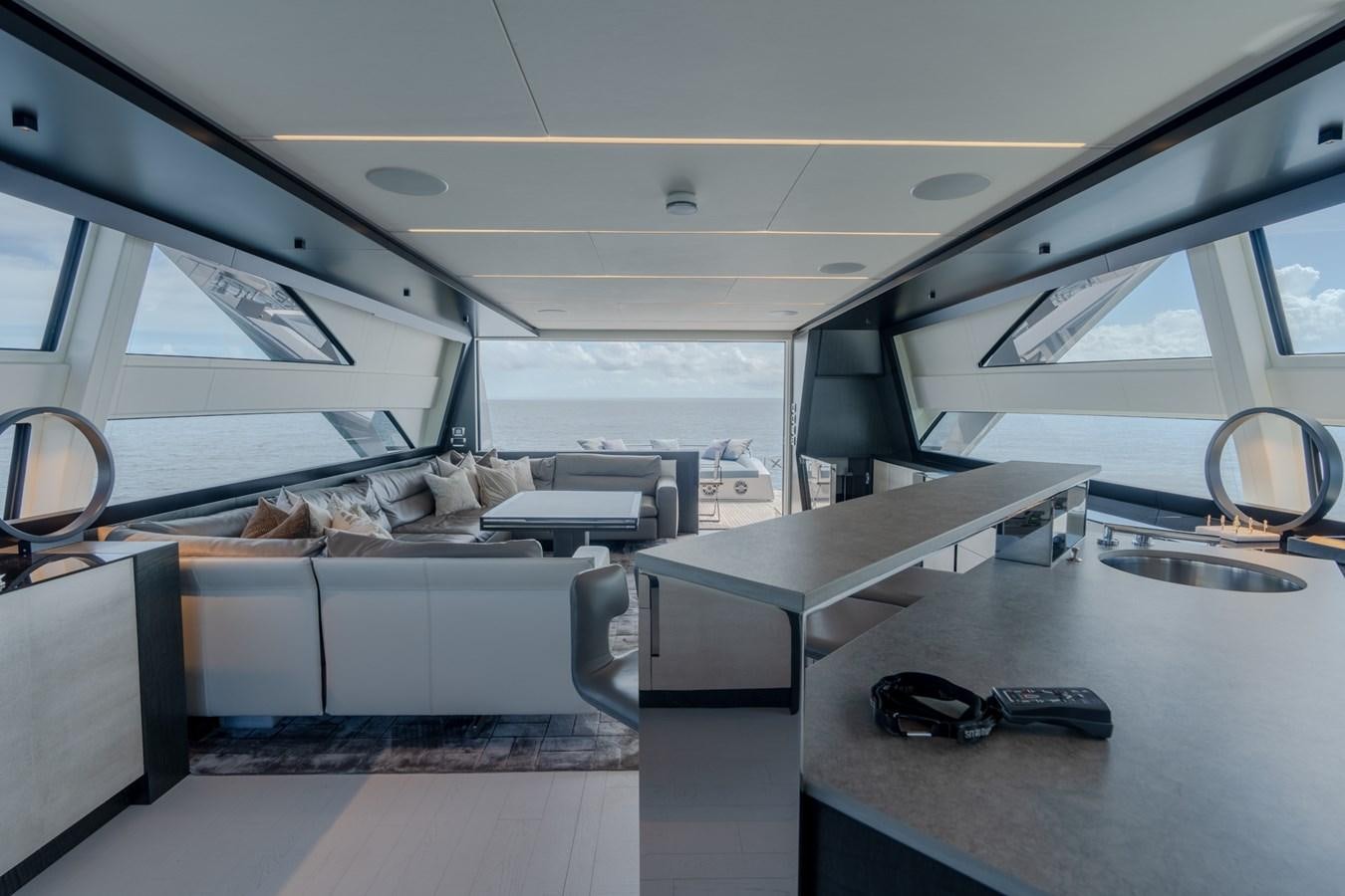 inside of a vehicle with a desk and a window aboard VINTAGE Yacht for Sale