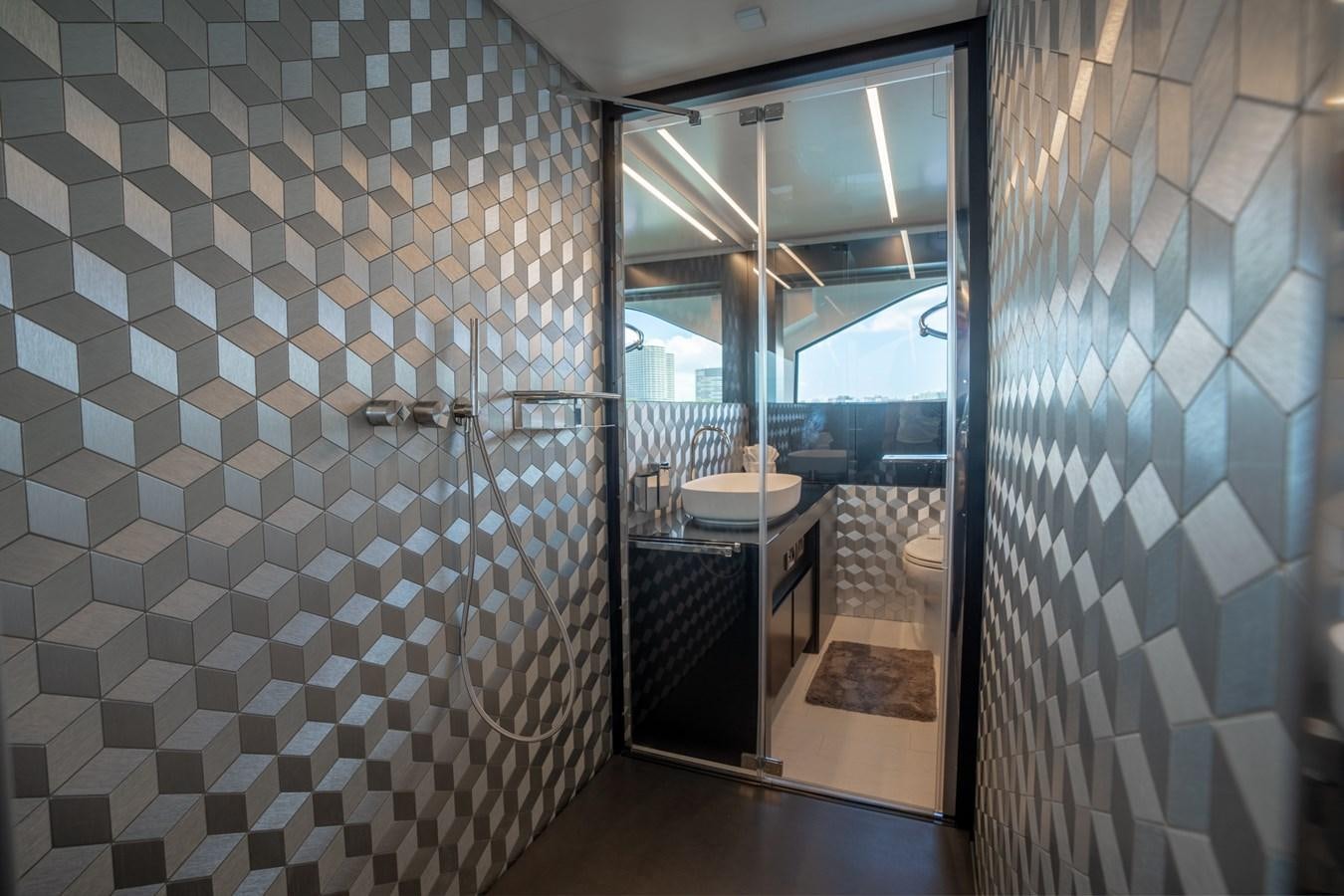 a bathroom with a shower aboard VINTAGE Yacht for Sale