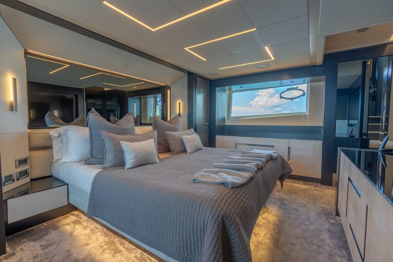a large bed in a room aboard VINTAGE Yacht for Sale