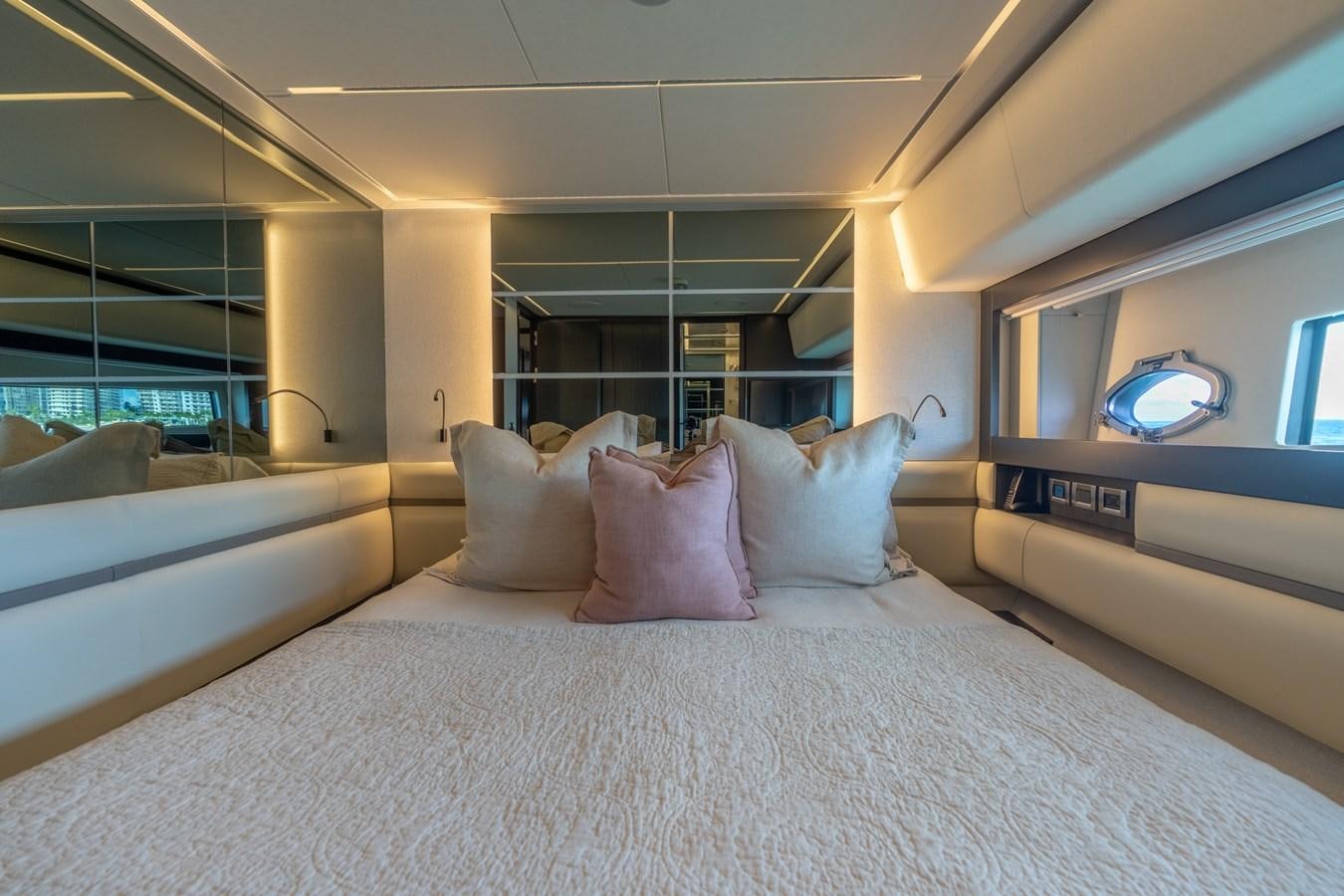 a bed with pillows aboard VINTAGE Yacht for Sale