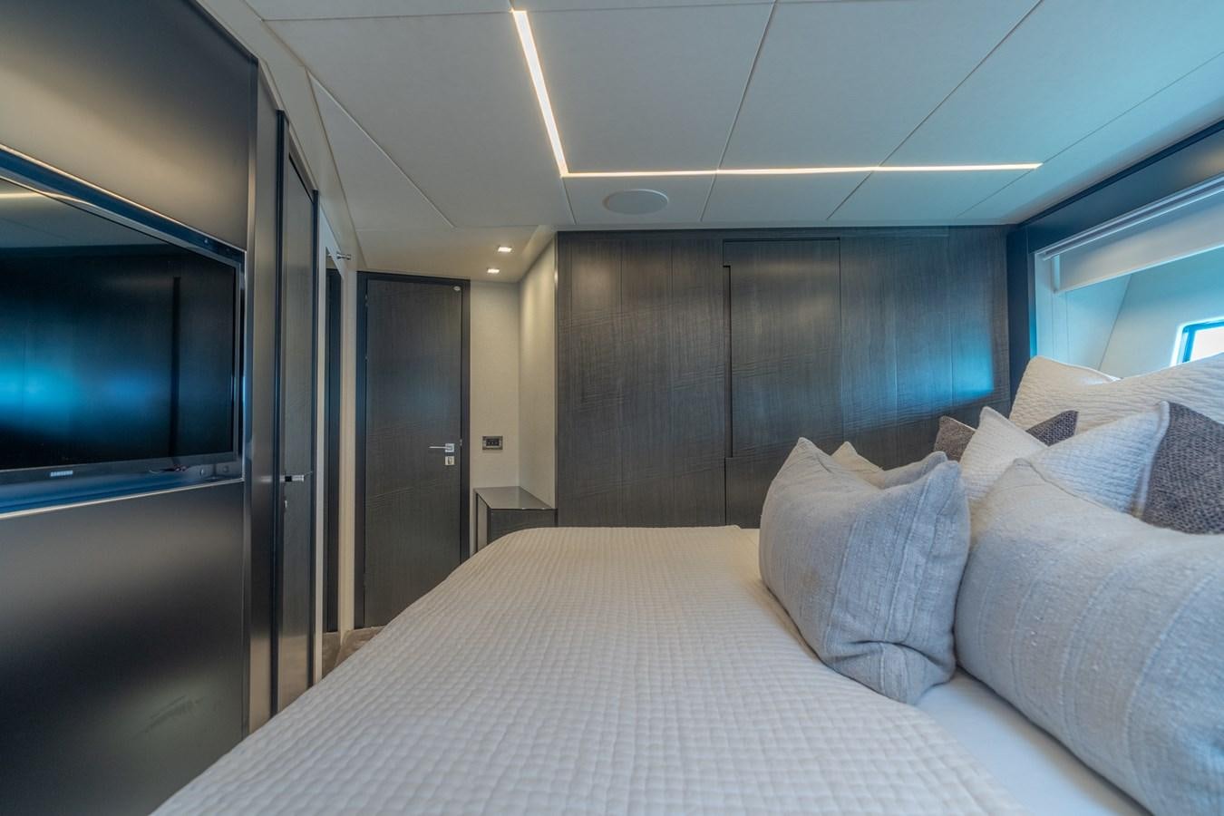 a bed in a room aboard VINTAGE Yacht for Sale