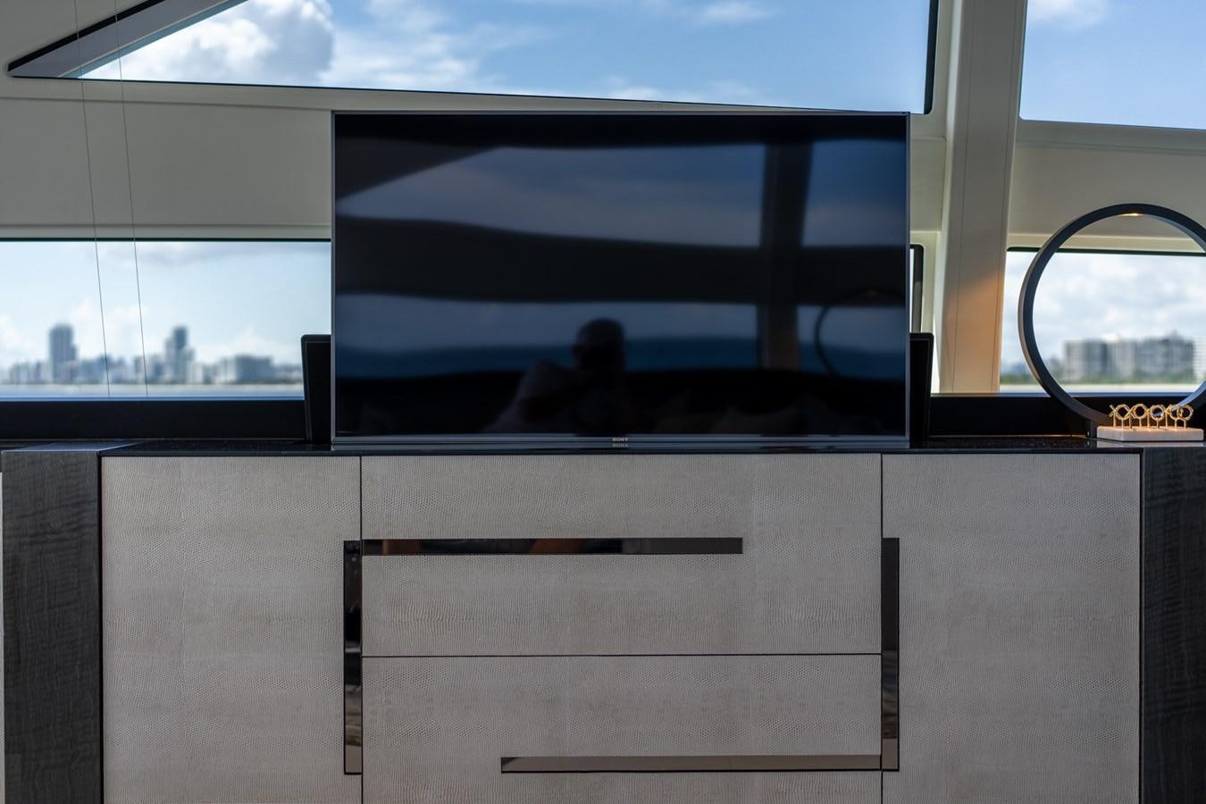 a reflection of a person in a mirror aboard VINTAGE Yacht for Sale