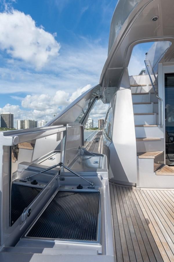 a deck with a railing and a view of a city aboard VINTAGE Yacht for Sale