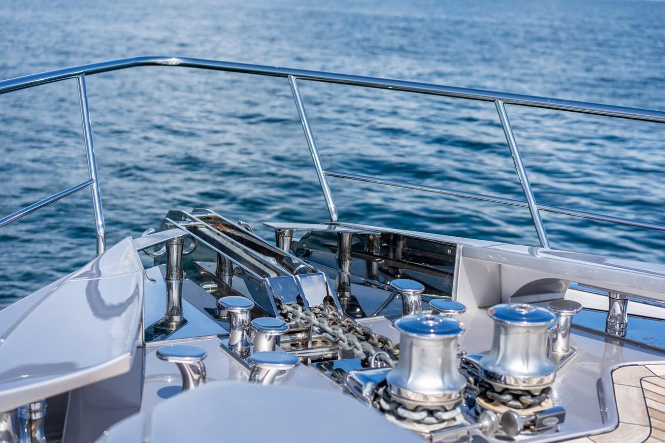 a boat with a metal railing aboard VINTAGE Yacht for Sale