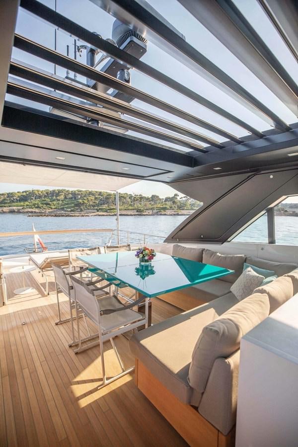 a table and chairs on a deck aboard 2019 SANLORENZO SX76 #16 Yacht for Sale
