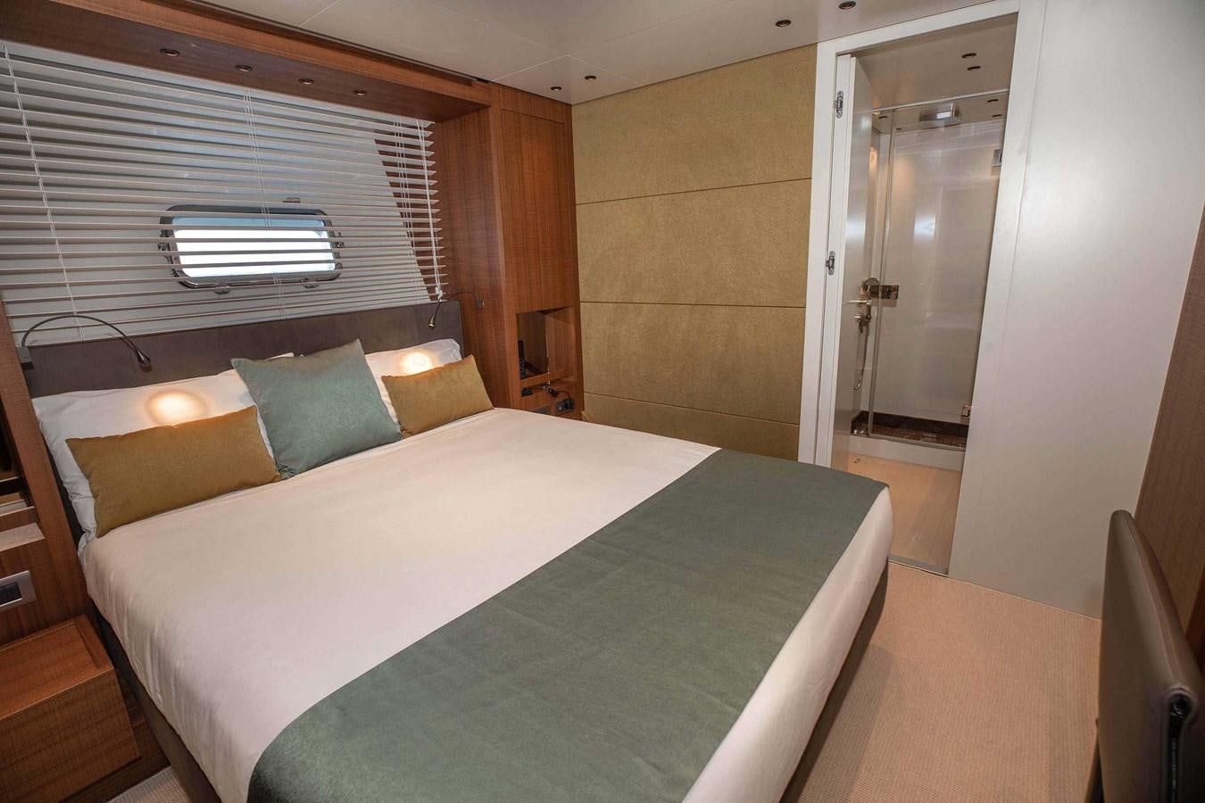 a bed in a room aboard 2019 SANLORENZO SX76 #16 Yacht for Sale