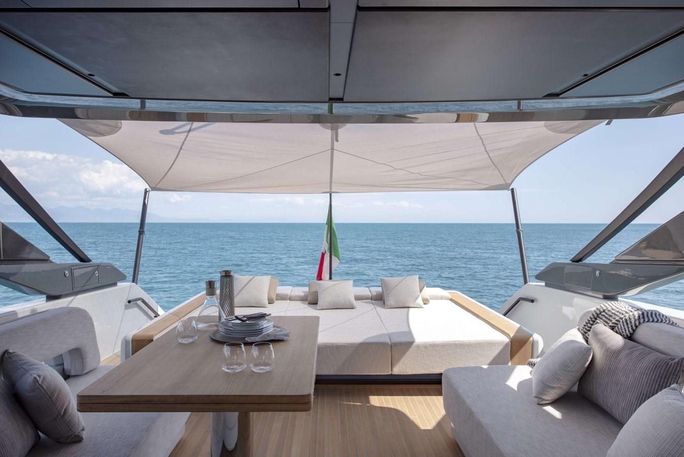 a table and chairs on a boat aboard 2024  BLUEGAME BG72/BG74 Yacht for Sale
