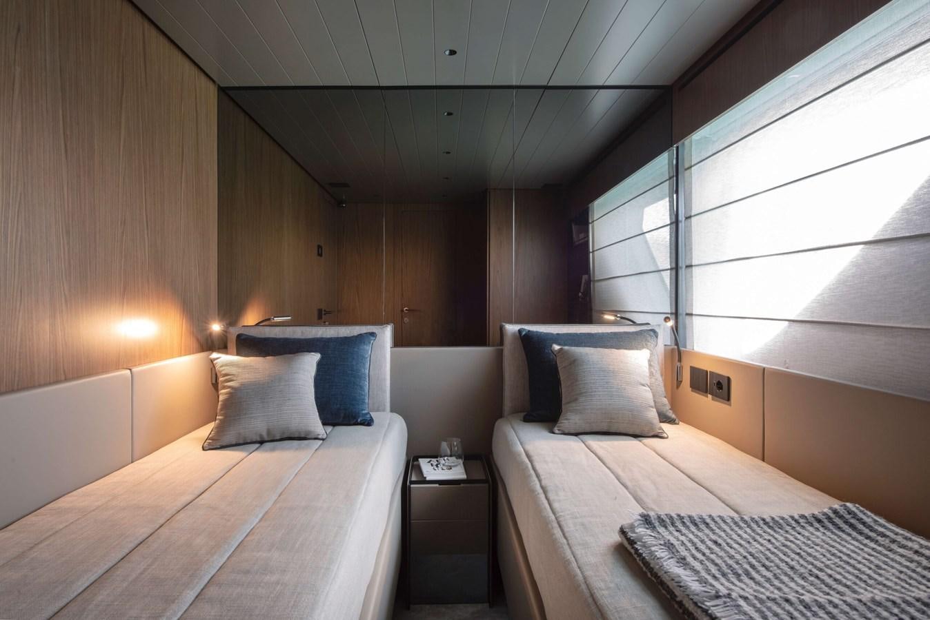a room with two beds aboard 2024  BLUEGAME BG72/BG74 Yacht for Sale