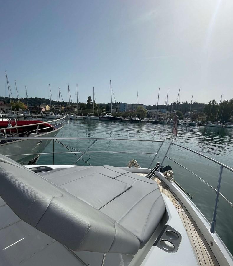 a boat on the water aboard SUNSEEKER 70' MANHATTAN Yacht for Sale