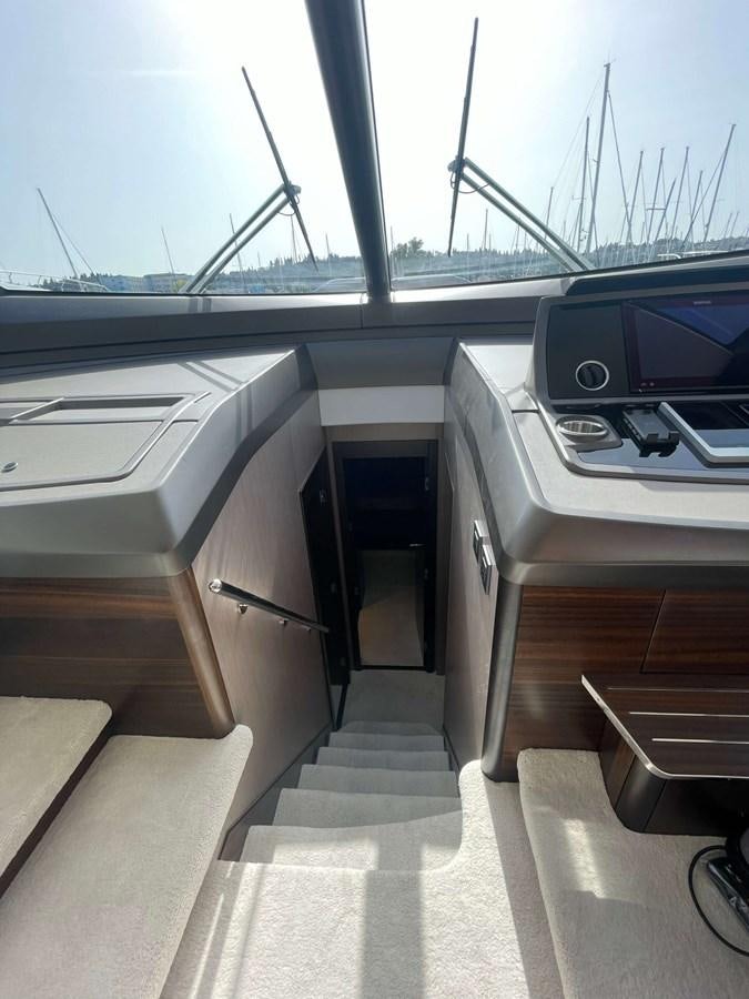 inside of a car aboard SUNSEEKER 70' MANHATTAN Yacht for Sale