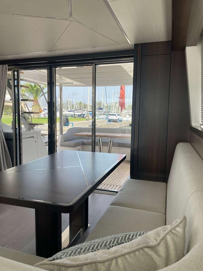 a table in a room aboard SUNSEEKER 70' MANHATTAN Yacht for Sale