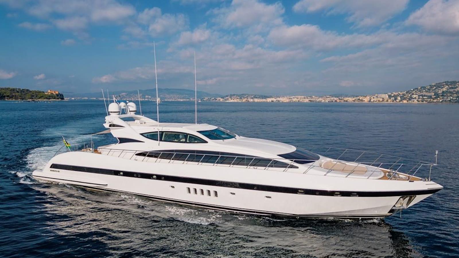 a white yacht on the water aboard MACH 2 Yacht for Sale