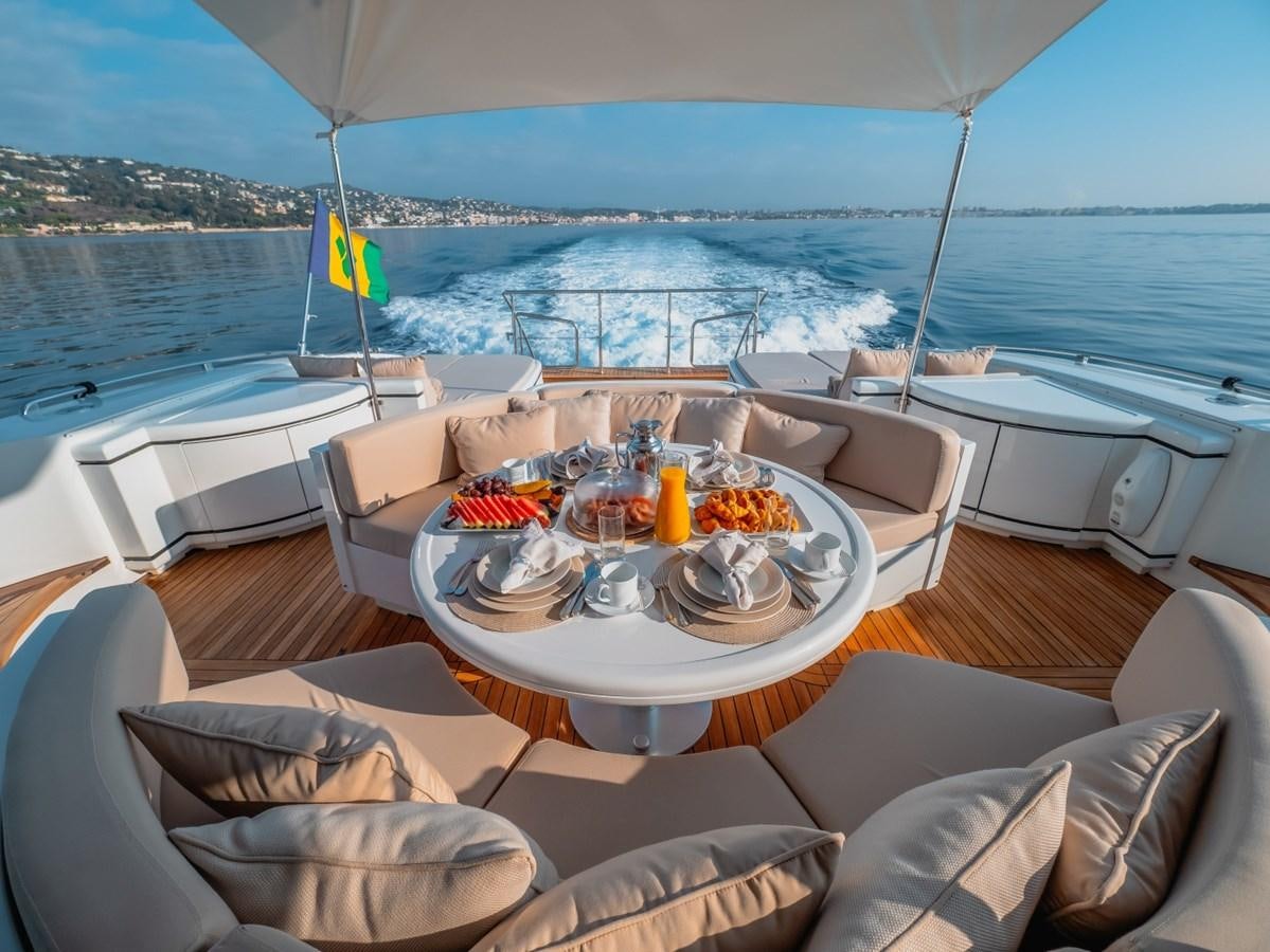 a table with food on it aboard WET PANTHER Yacht for Sale