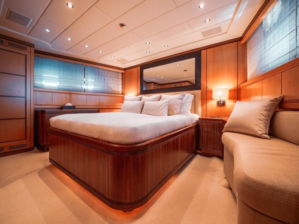 a room with a bed and a tv aboard WET PANTHER Yacht for Sale