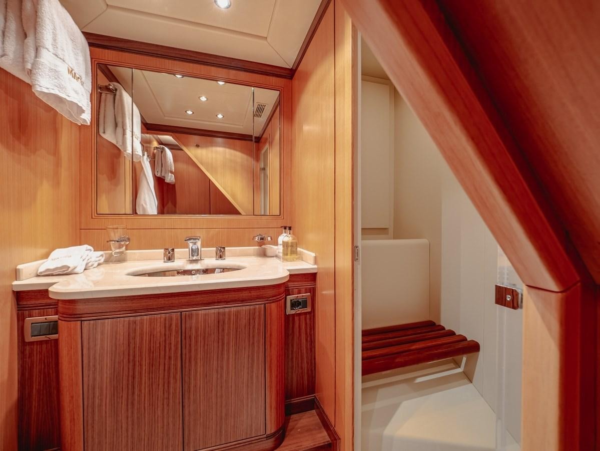 a bathroom with a sink and a mirror aboard WET PANTHER Yacht for Sale