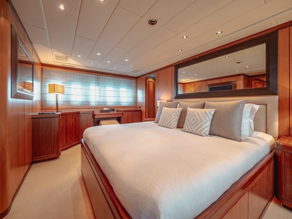 a large bed in a room aboard WET PANTHER Yacht for Sale