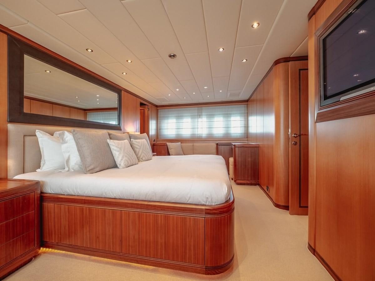 a bed in a room aboard WET PANTHER Yacht for Sale