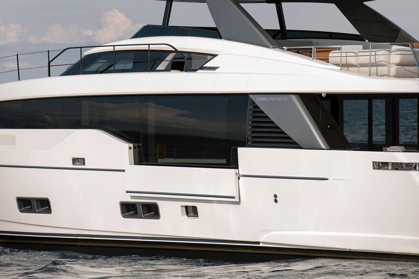 a white yacht on the water aboard #813 - SANLORENZO SL90A Yacht for Sale
