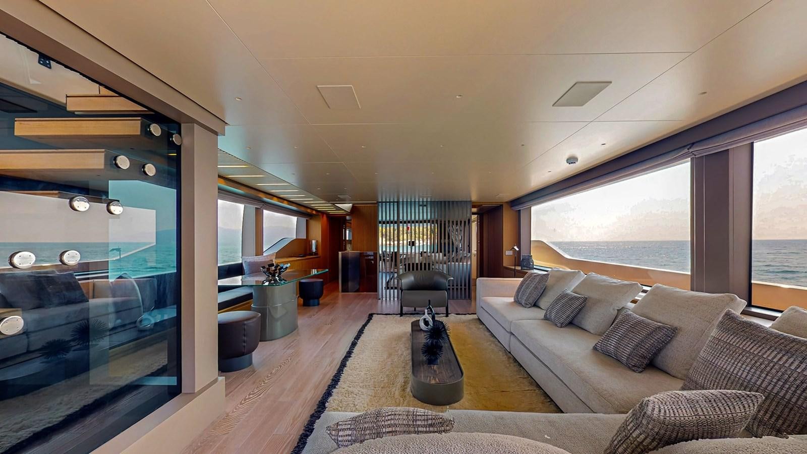 a living room with a large window aboard #813 - SANLORENZO SL90A Yacht for Sale