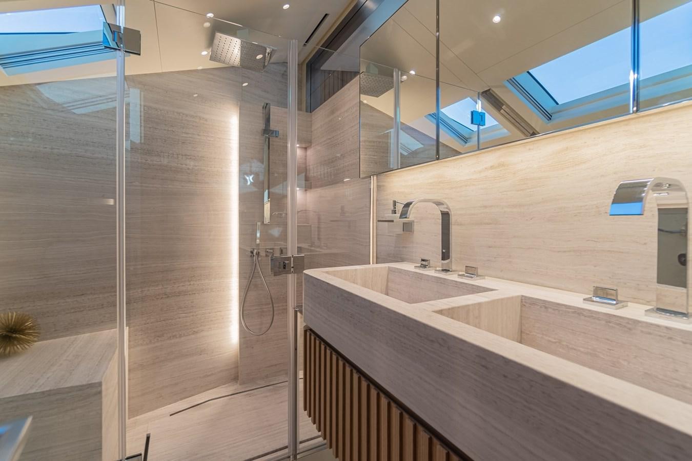 a bathroom with a large mirror aboard #813 - SANLORENZO SL90A Yacht for Sale