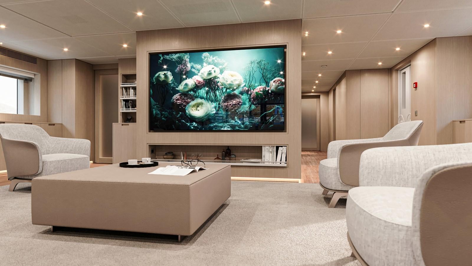 a large living room with a large screen aboard NO STRESS TWO Yacht for Sale