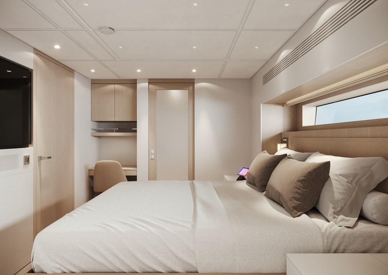 a bedroom with a bed and a chair aboard NO STRESS TWO Yacht for Sale