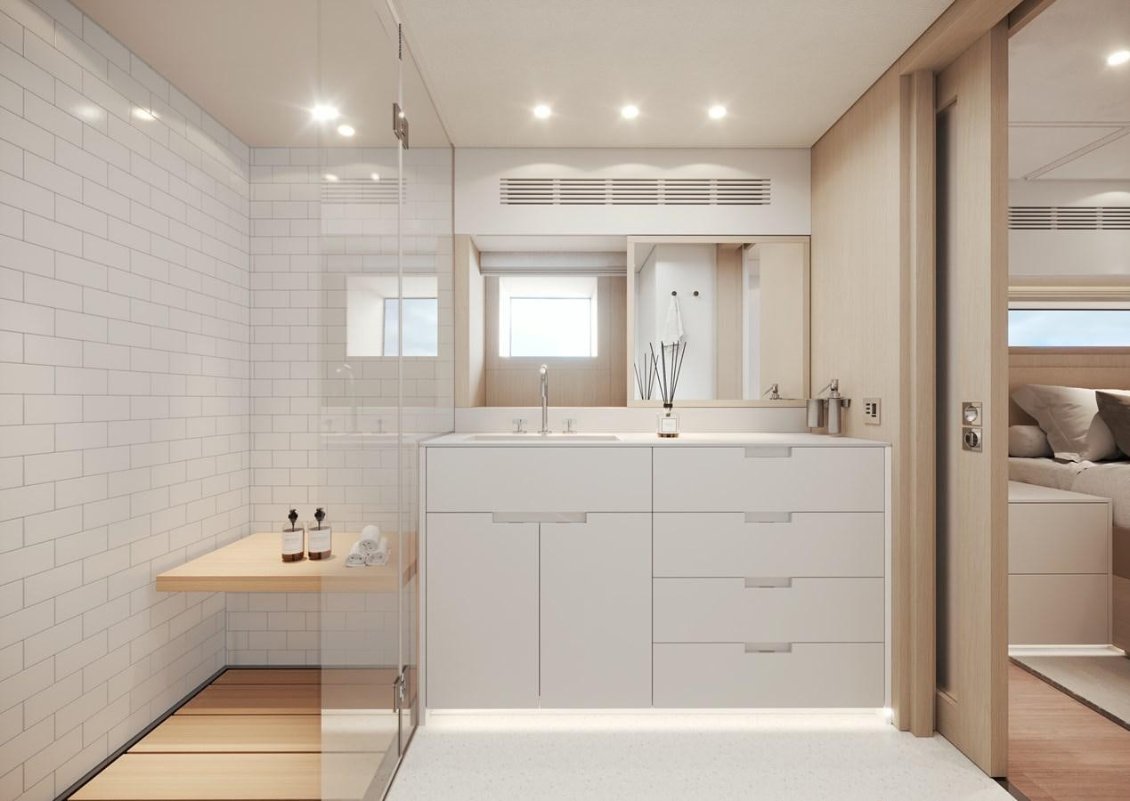 a bathroom with a sink and a mirror aboard NO STRESS TWO Yacht for Sale