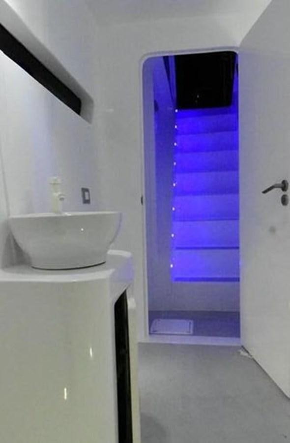 a purple and white bathroom aboard 2020 COMPASS SEA COMPASS 82 Yacht for Sale