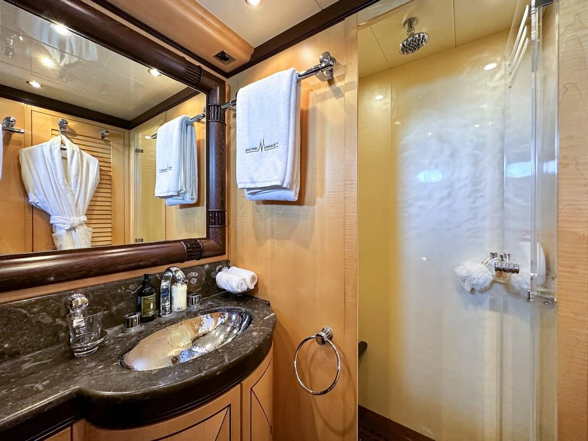 a bathroom with a sink and a shower aboard BEAR MARKET Yacht for Sale