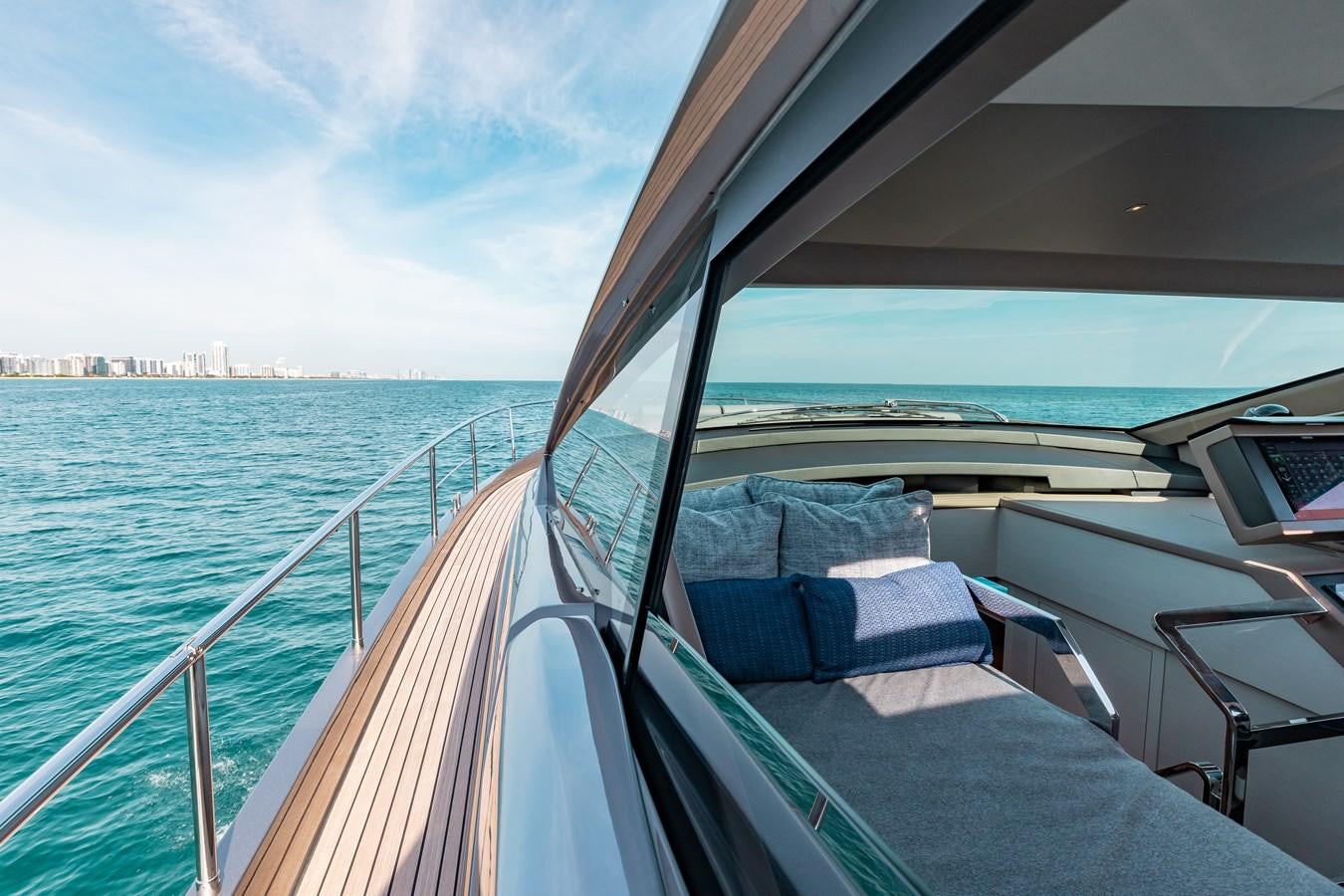 a boat with a large amount of pillows on it aboard UNREEL Yacht for Sale