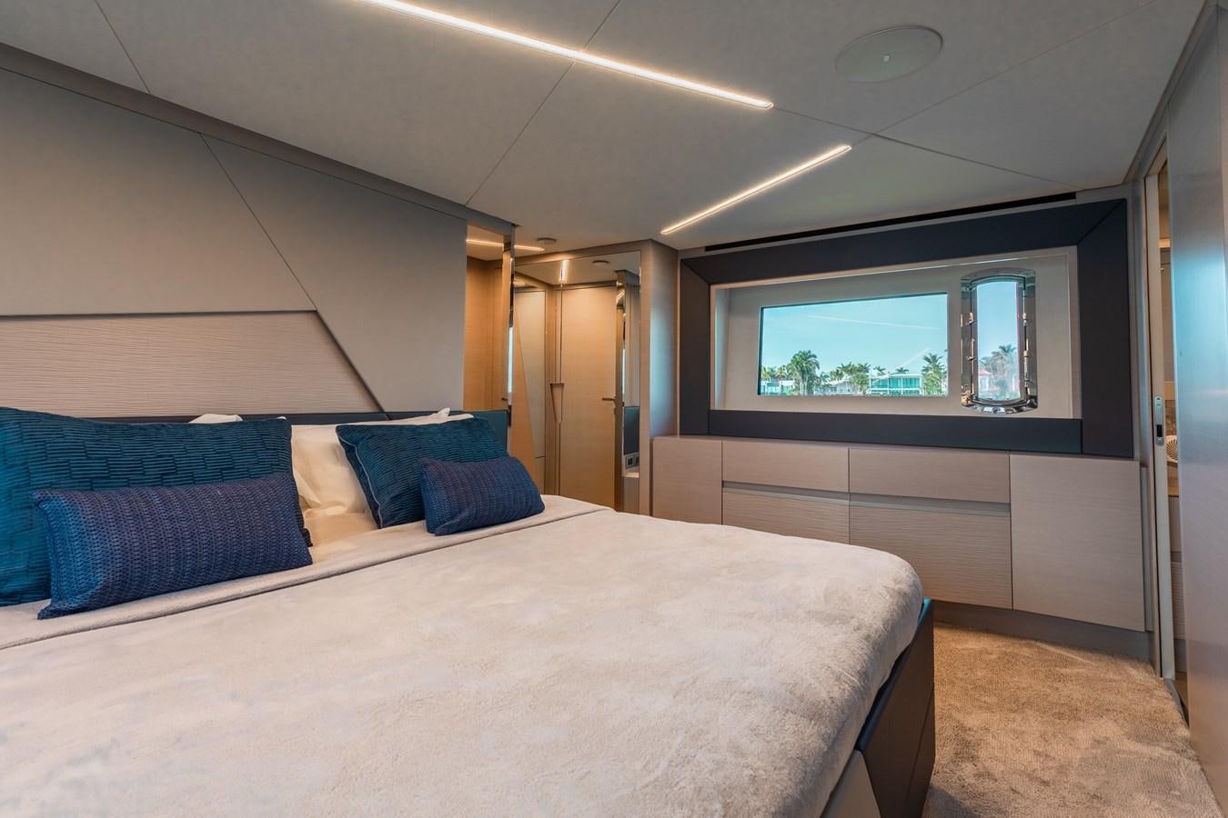 a large bed in a room aboard UNREEL Yacht for Sale