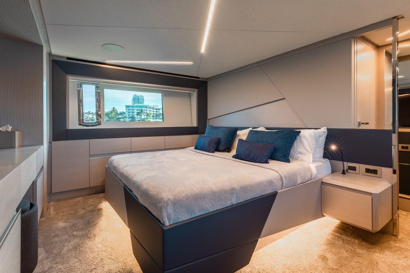 a bed in a room aboard UNREEL Yacht for Sale