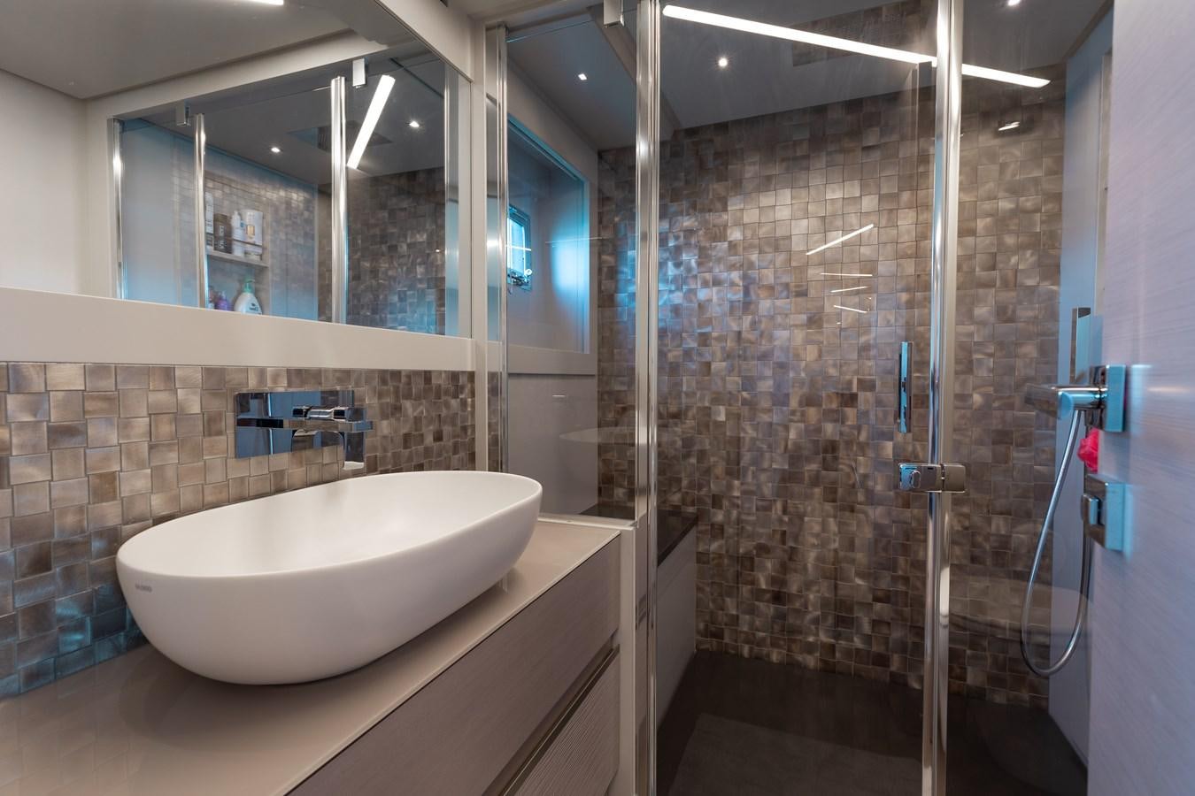a bathroom with a large sink aboard UNREEL Yacht for Sale