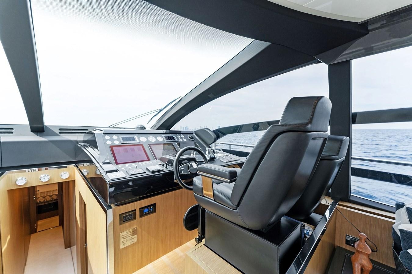 a room with a desk and a laptop aboard LADY LEENIE II Yacht for Sale