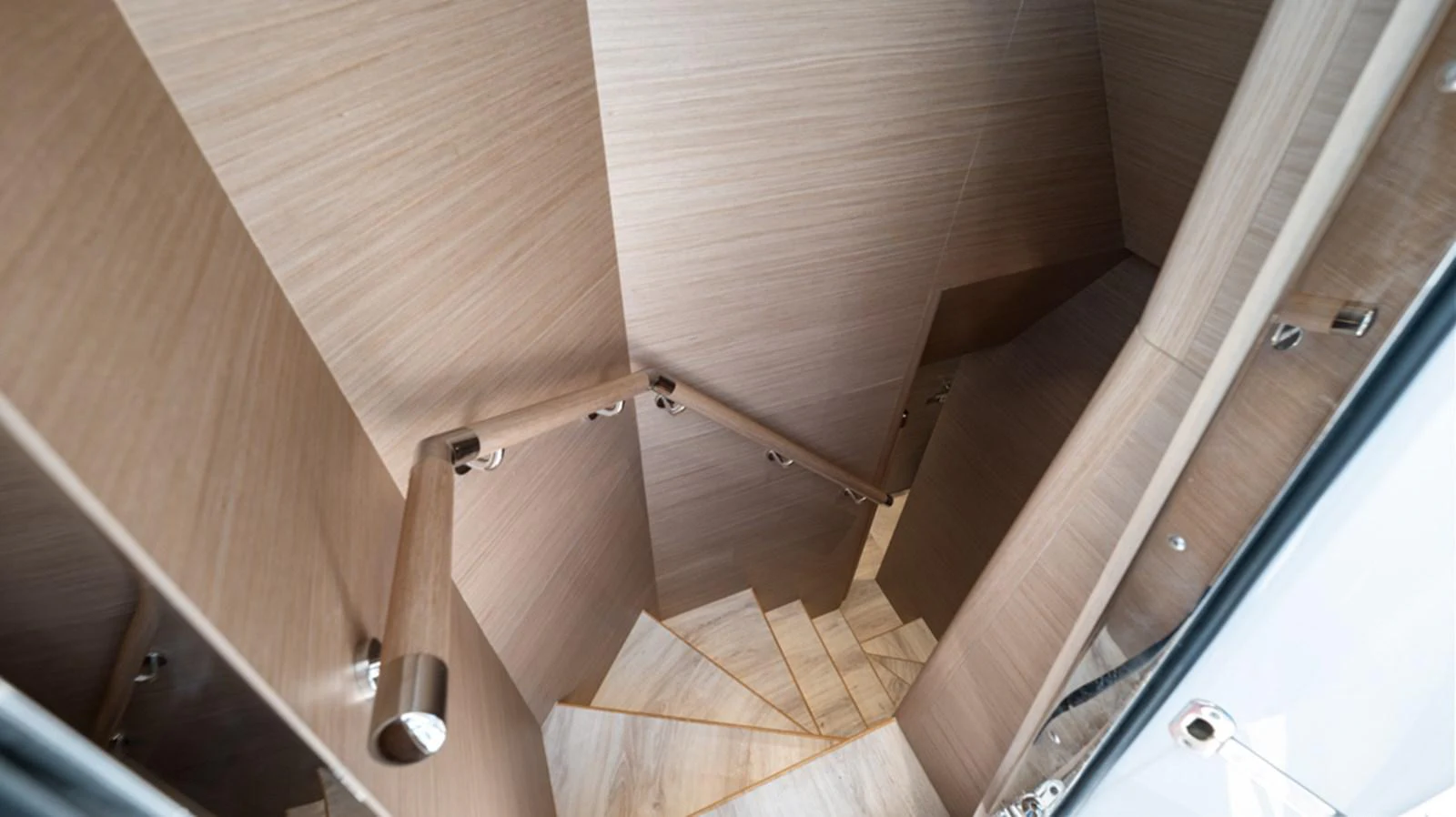 a wooden staircase with wooden walls aboard 90 HORIZON Yacht for Sale